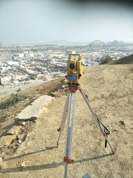 Surveyor with totalstation 03193307245 2