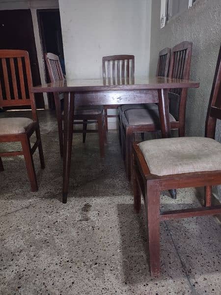 Urgent sale One Table with 6 chairs price 15000/= 1