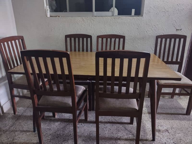 Urgent sale One Table with 6 chairs price 15000/= 2