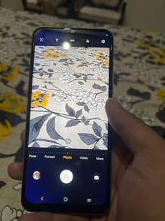 Vivo y21. Number :- 03298786000 0