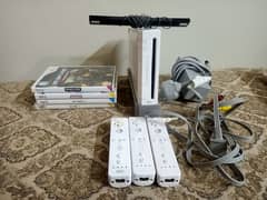 Nintendo Wii with 4 original working games