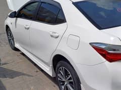 Toyota Corolla Altis 2019 no 03335236454 raja Nasir