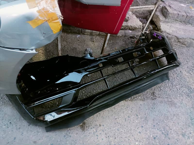 Honda City Bonnet Bumpers Grills Head Lights Side Mirrors 4