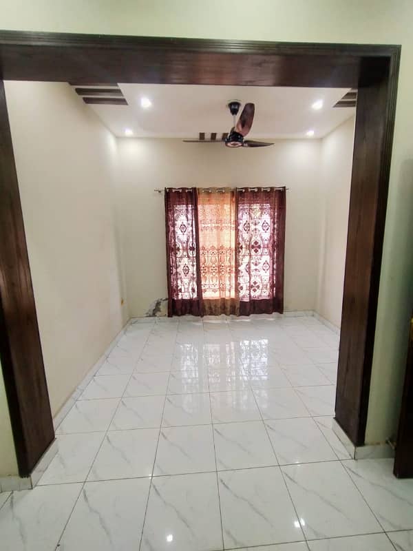 4 Marla beautiful tile floor House For Sale 2
