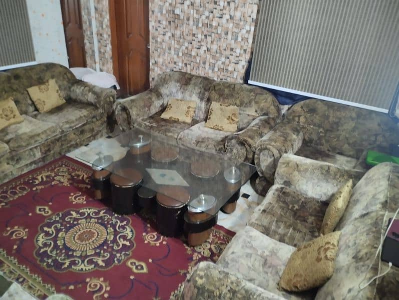 11 seater luxury sofa with  1 center  table with 4 table stools 11