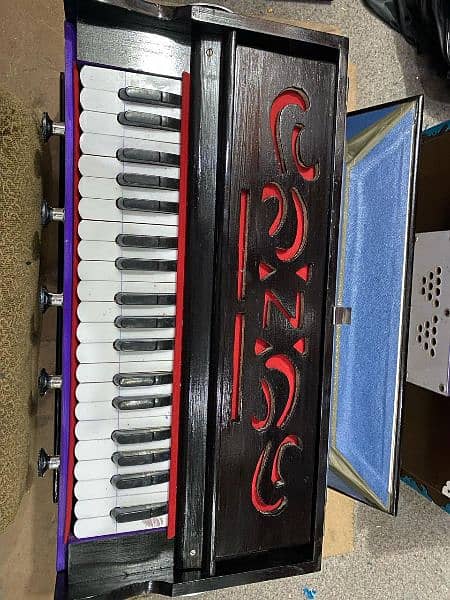 single below harmonium 2 year warranty 12