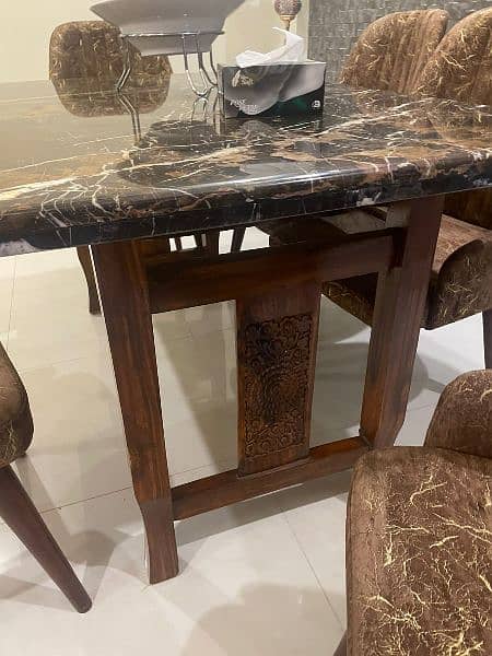 Beautiful Marble top pure wooden base dinning table. 3