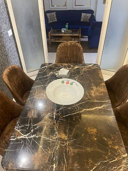 Beautiful Marble top pure wooden base dinning table. 4