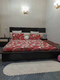 low profile, wooden bed in good condition