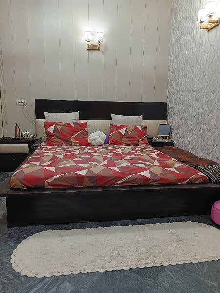 low profile, wooden bed in good condition 0