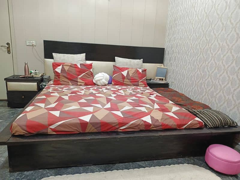 low profile, wooden bed in good condition 1