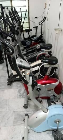 exercise cycle airbike elliptical tredmil recumbent spin bike machine