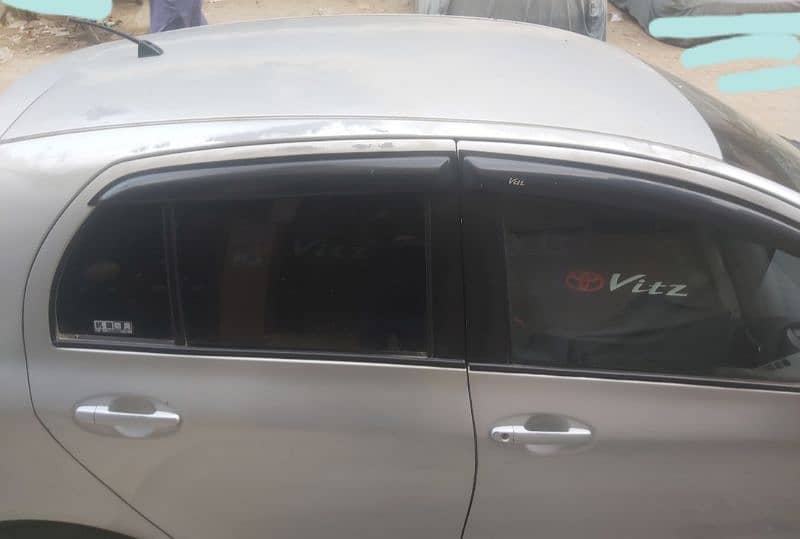 Silver Toyota Vitz 2009 4