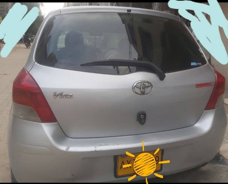 Silver Toyota Vitz 2009 6