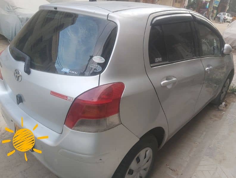 Silver Toyota Vitz 2009 8