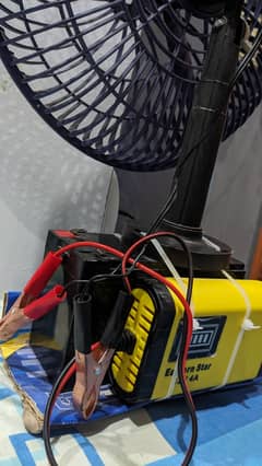Local brand. . chargeable fan with new battery. . .
