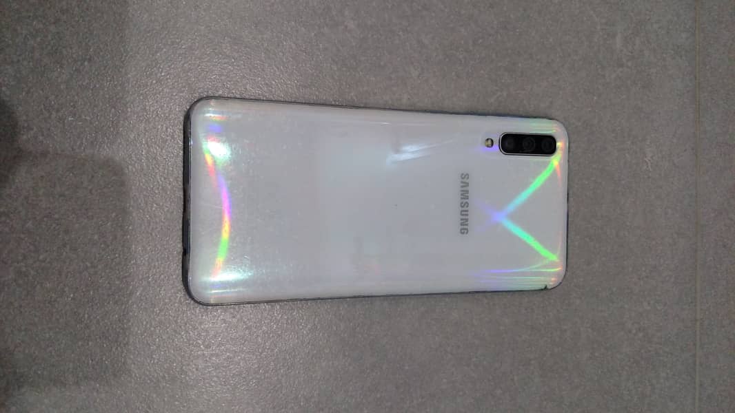 Samsung A50 4/128 all ok 9/10 condition only fingerprint not working 11