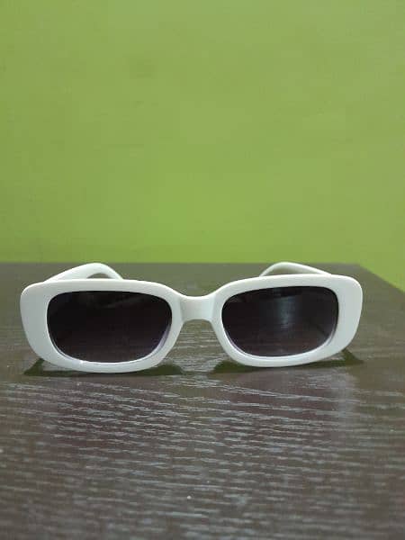 white sun glasses 0