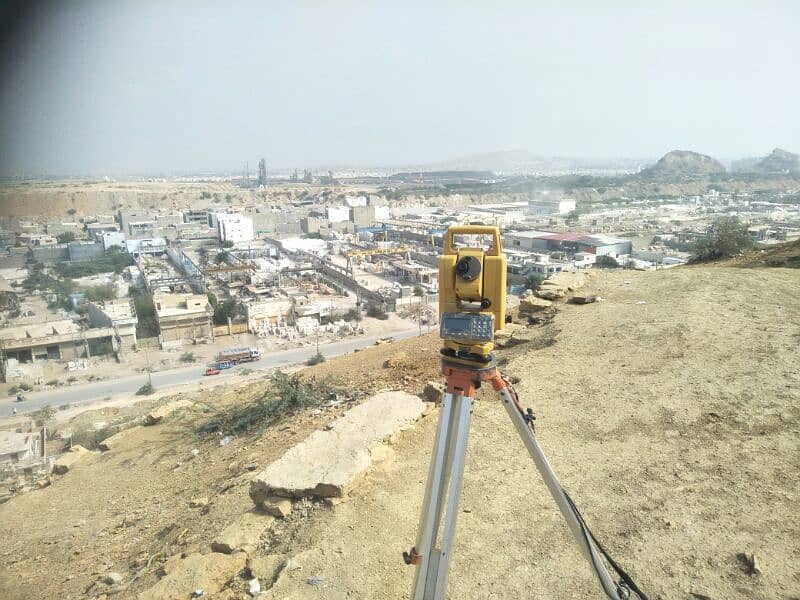 Land Surveyor With TotalStation 03193307245 1