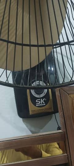 SK bracket fan for sale in excellent condition