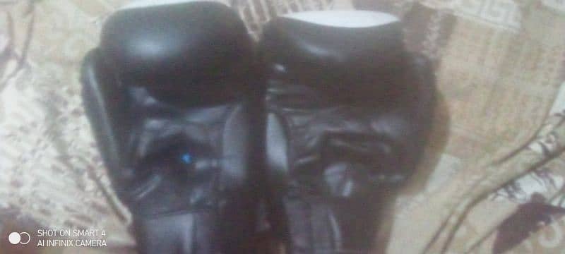 Boxing gloves for sale in cheap price. 1