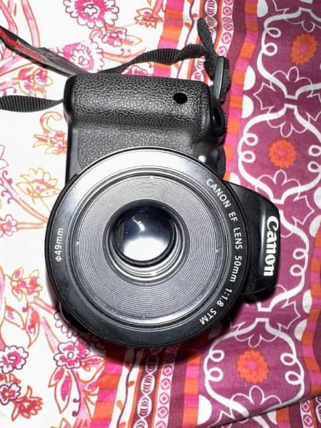 Canon eos 700 d 10/10 condition with EF LENS STM 1:1.8 1