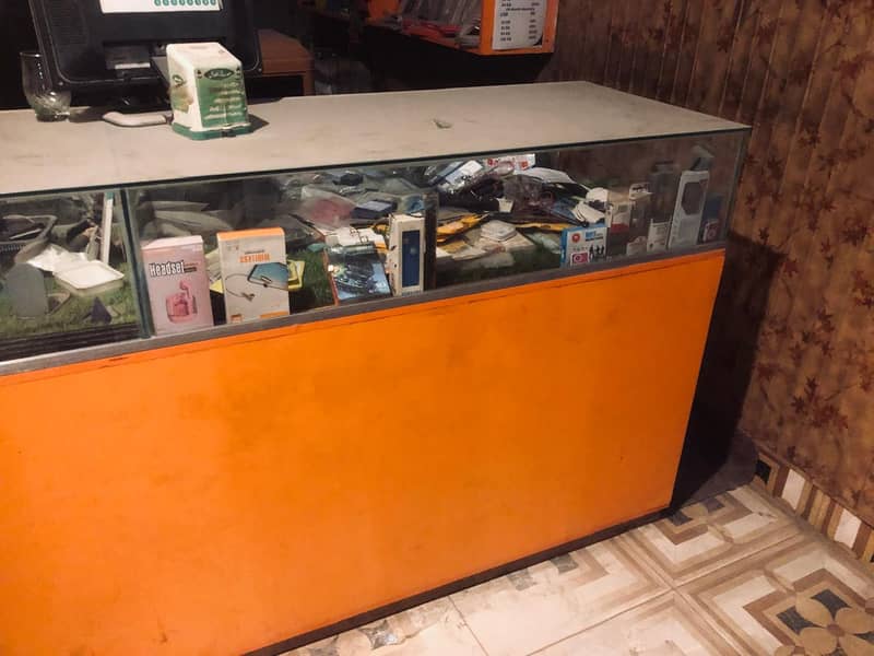 Wooden Counter and Racks for Mobile shop just 8month use 12