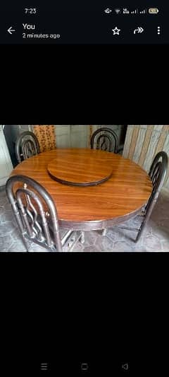 5 chairs and round dining table