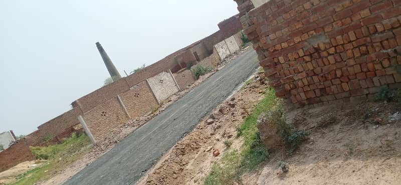 70 Marla semi commercial plot on 50ft road near new defence road kahna nau Lahore 1