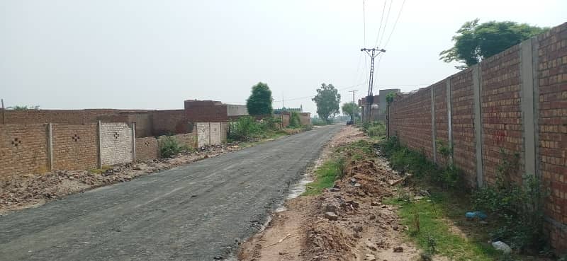 70 Marla semi commercial plot on 50ft road near new defence road kahna nau Lahore 3