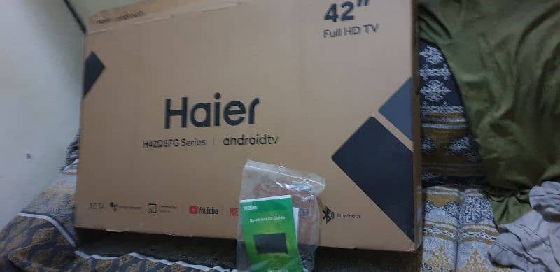 Haier 42 inches android led with original remote box stand packing 5