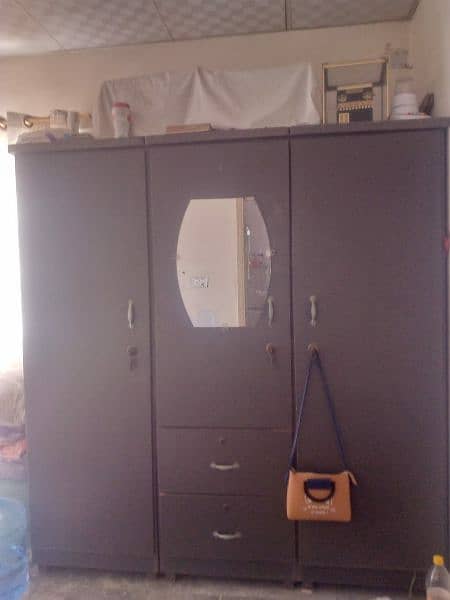 tripple door cupboard 1