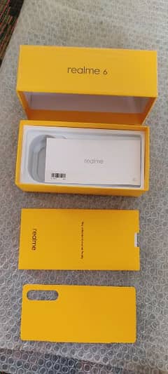 Samsung Note20 Ultra and realme 6 boxes
