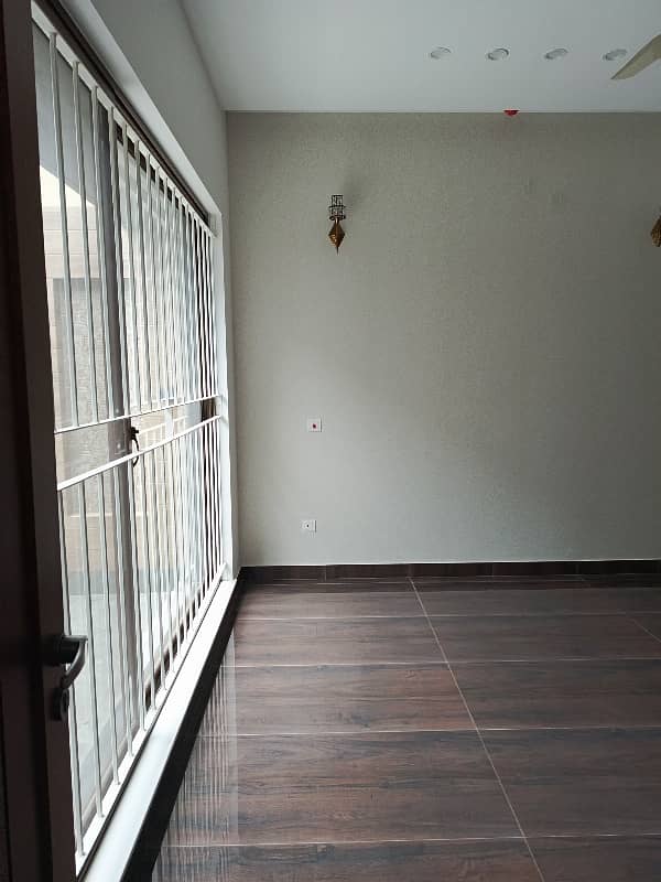 1 KANAL HOUSE FOR RENT IN DHA EME SOCIETY LAHORE 5 Master Bedroom 2 TV Launch Driang Room Dining Table 2 Kichan Servant Quarter Giraj Taris Store Podar Washroom Study Room Laundry 11