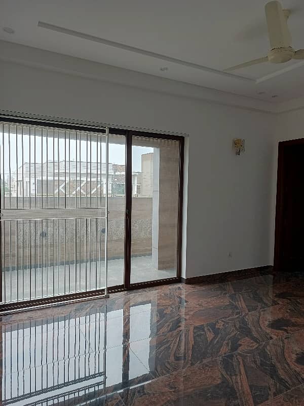 1 KANAL HOUSE FOR RENT IN DHA EME SOCIETY LAHORE 5 Master Bedroom 2 TV Launch Driang Room Dining Table 2 Kichan Servant Quarter Giraj Taris Store Podar Washroom Study Room Laundry 13