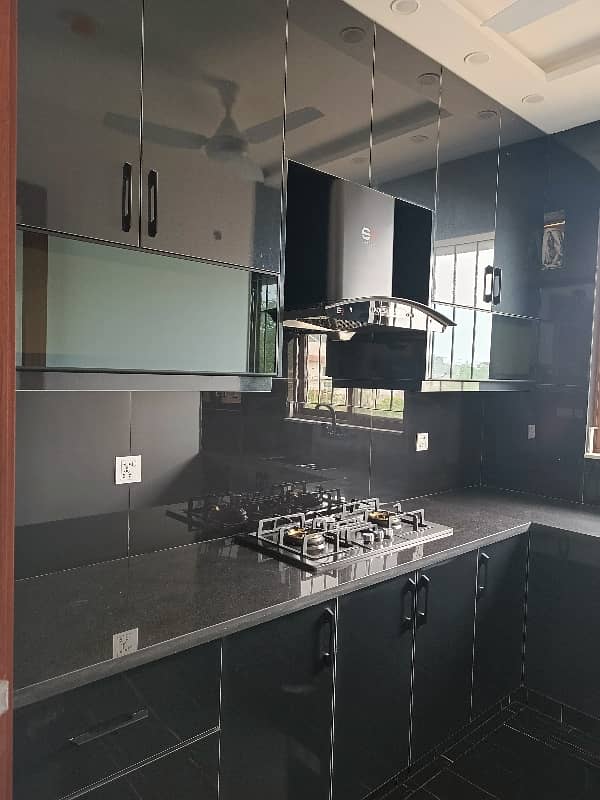 1 KANAL HOUSE FOR RENT IN DHA EME SOCIETY LAHORE 5 Master Bedroom 2 TV Launch Driang Room Dining Table 2 Kichan Servant Quarter Giraj Taris Store Podar Washroom Study Room Laundry 18