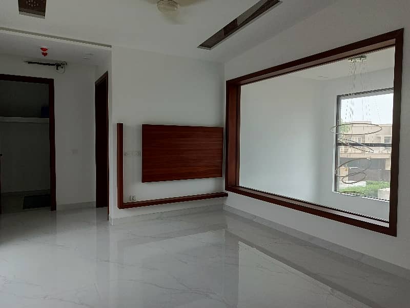 1 KANAL HOUSE FOR RENT IN DHA EME SOCIETY LAHORE 5 Master Bedroom 2 TV Launch Driang Room Dining Table 2 Kichan Servant Quarter Giraj Taris Store Podar Washroom Study Room Laundry 19