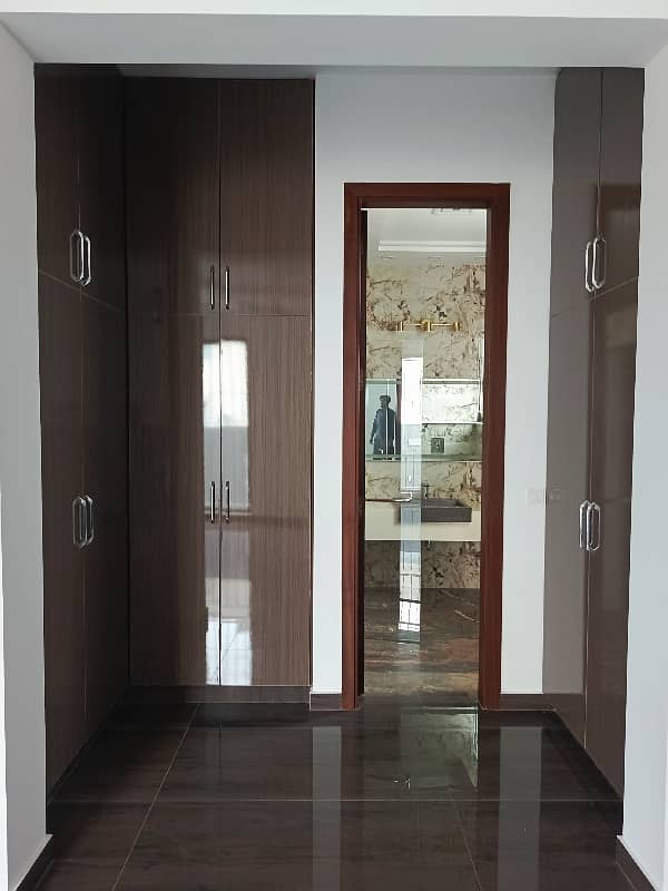 1 KANAL HOUSE FOR RENT IN DHA EME SOCIETY LAHORE 5 Master Bedroom 2 TV Launch Driang Room Dining Table 2 Kichan Servant Quarter Giraj Taris Store Podar Washroom Study Room Laundry 27