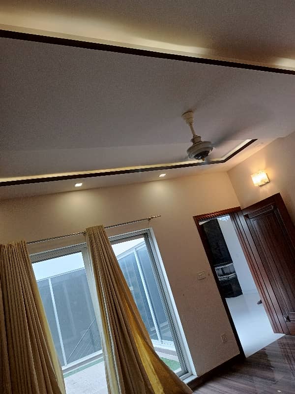 1 KANAL HOUSE FOR RENT IN DHA EME SOCIETY LAHORE 5 Master Bedroom 2 TV Launch Driang Room Dining Table 2 Kichan Servant Quarter Giraj Taris Store Podar Washroom Study Room Laundry 42