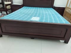 Wooden bed, diamond mattress and two side tables