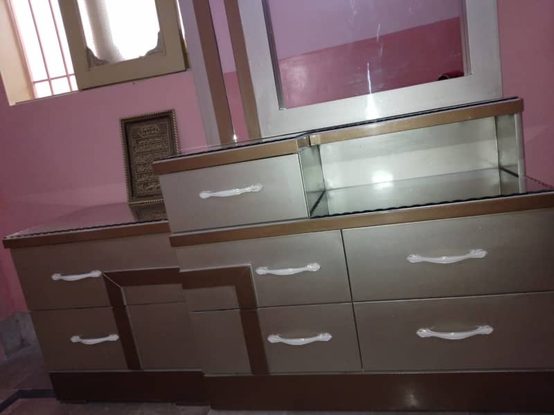I am selling new bed, cupboard, dressing table 2