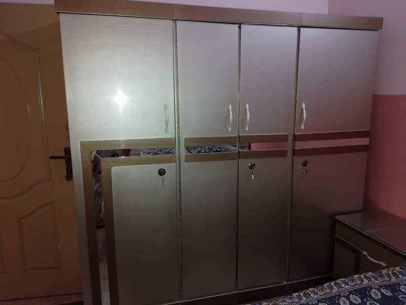 I am selling new bed, cupboard, dressing table 3