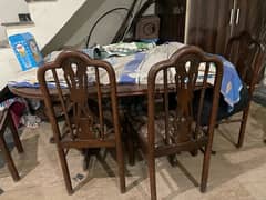 dining table with five chairs
