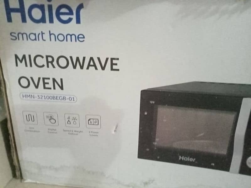 Haier microwave oven HMN-32100begb 0