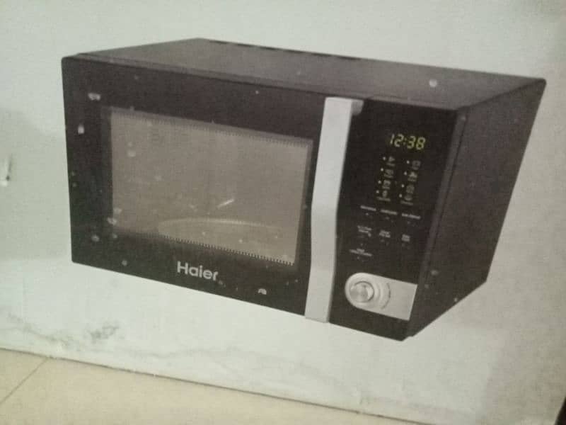 Haier microwave oven HMN-32100begb 1