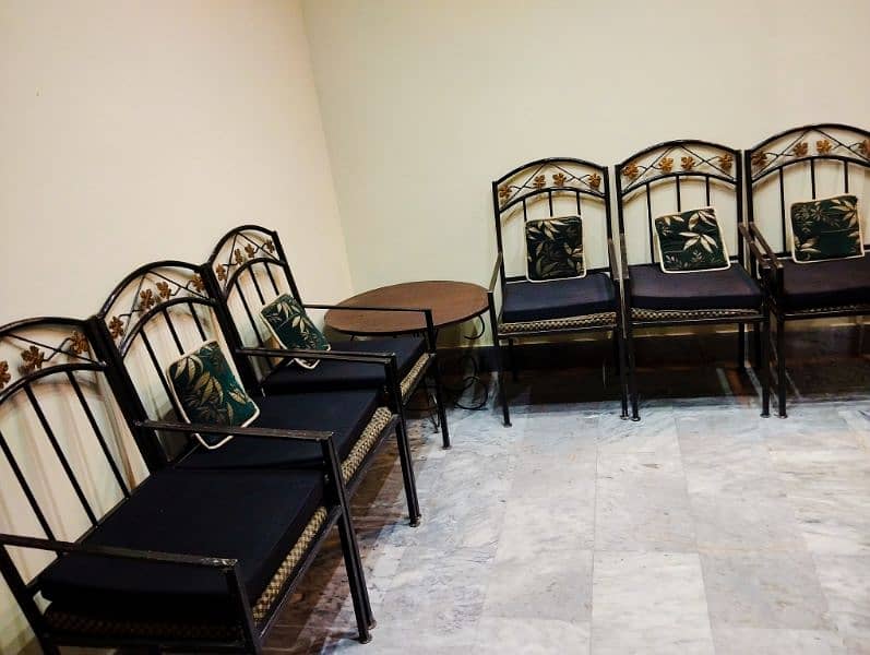 Six Rod Iron Chairs with a Centre Table Available for Sale. 0