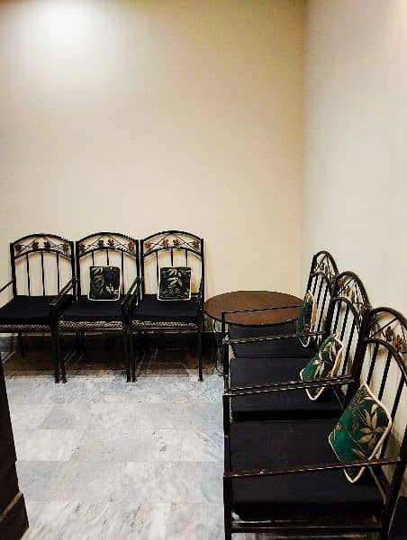 Six Rod Iron Chairs with a Centre Table Available for Sale. 1