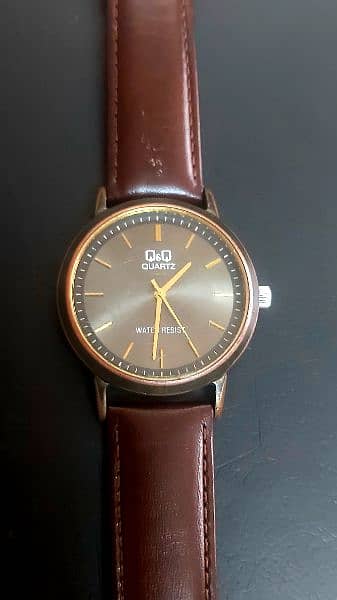 omax and q and q watches quartz 3