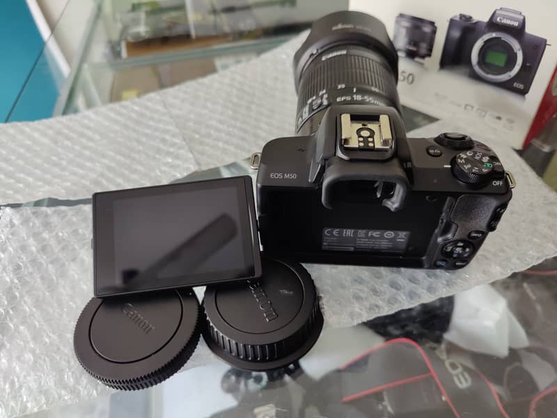 Canon M50 with adopter and 18-55mm STM lens 1