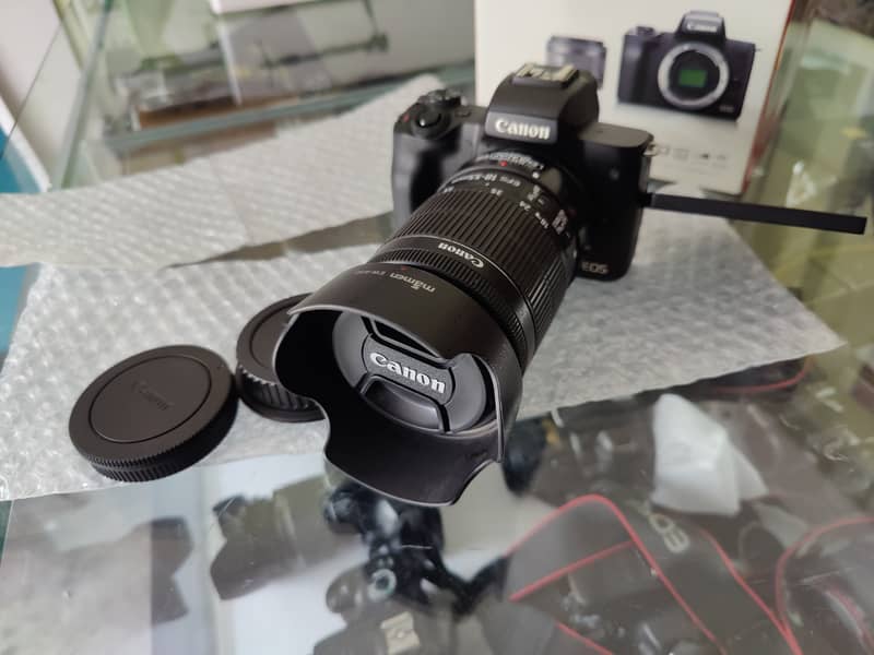 Canon M50 with adopter and 18-55mm STM lens 2